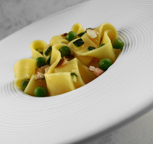 Tagliatelle  met courgette, kastanjechampignons en doperwten