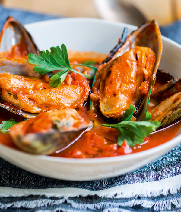 Mosselen in kruidige tomatensaus